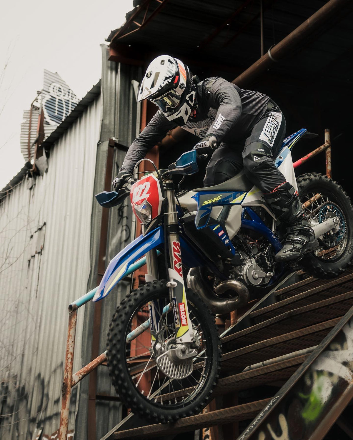 Sam King riding bike in Leatt kit